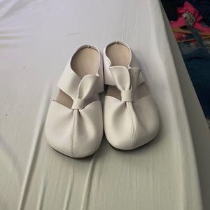 These are white mule slippers.